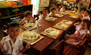 Students of Umapad Day Care Center enjoying their meal provided by the Supplementary Feeding Program.
