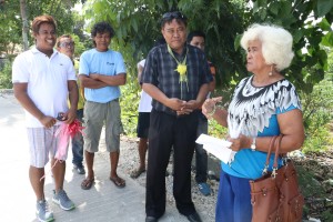 Felotia Jubay, 70, of Barangay Ibabao, Cordova (wearing blue printed blouse) shares the struggles during the construction of the Kalahi-CIDSS barangay road project.
