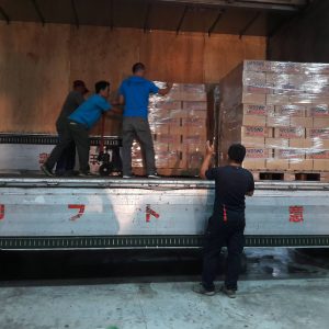 DSWD workers load food packs for hauling to Mactan-Benito Ebuen Airbase to augment the need for food in Region 2, which was badly hit by Typhoon Lawin.