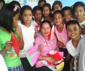 Aileen receive gifts from her students during Teachers Day.